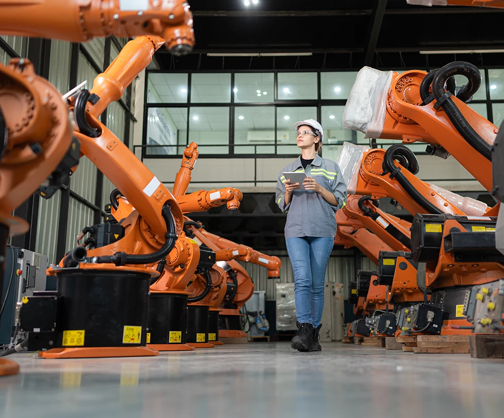 Female auditor inspecting a unit at a manufacturing company