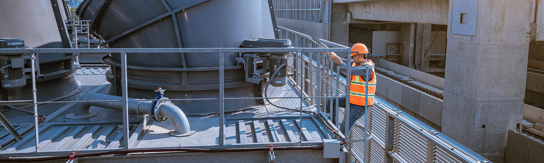 AgriCity Insurance provides Workers Compensation Insurance coverage to protect hardworking businesses - engineer checking industry cooking tower